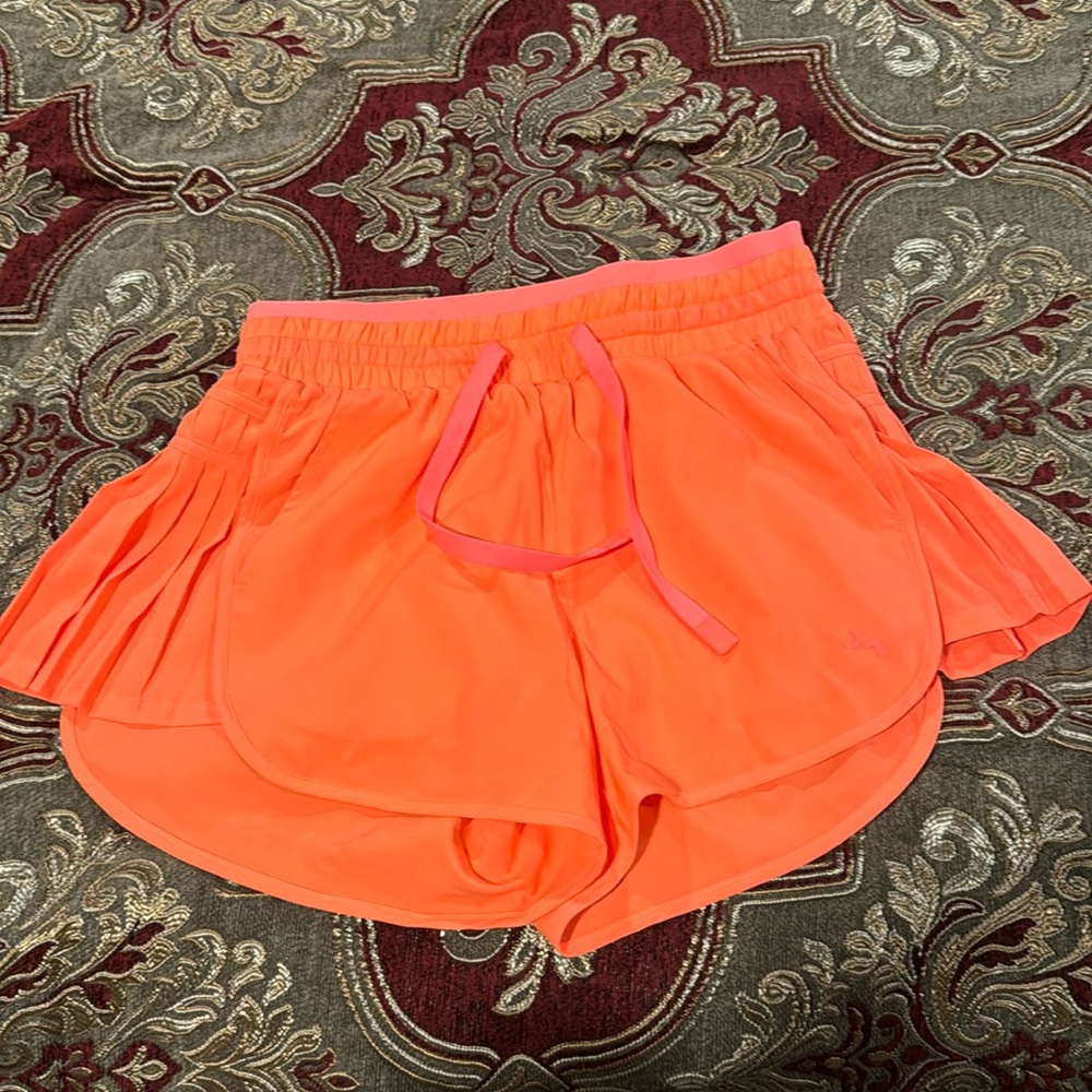 Bright orange JoyLab workout shorts 🧡